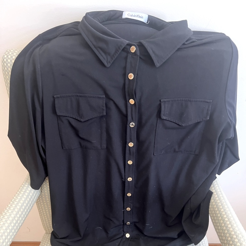 Calvin Klein jersey blouse, size 1 X. Made of jersey material but not clingy!